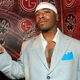 Sisqo in 2006, dialing a mid-'00s butt on his flip phone (Photo: Michael Buckner/Getty)